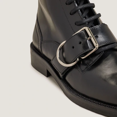 Boots &agrave; lacets et boucles in black leather | disabelle