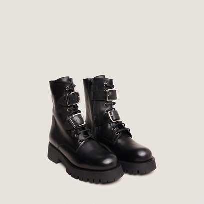 Boots &agrave; boucles m&eacute;talliques in black leather | dalay
