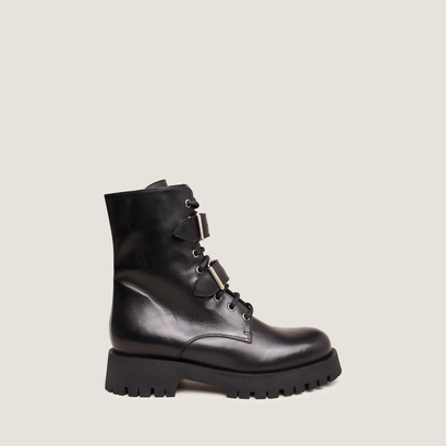 Boots &agrave; boucles m&eacute;talliques in black leather | dalay