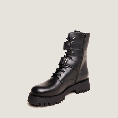 Boots &agrave; boucles m&eacute;talliques in black leather | dalay