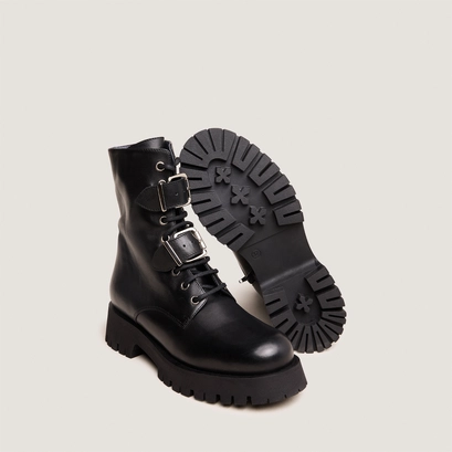 Boots &agrave; boucles m&eacute;talliques in black leather | dalay