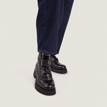 Boots &agrave; boucles m&eacute;talliques in black leather | dalay
