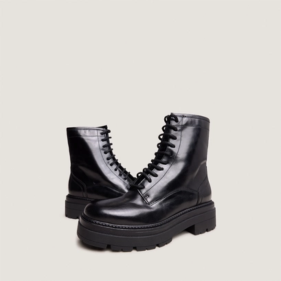Boots &agrave; semelles crant&eacute;es et lacets in black leather | dicus