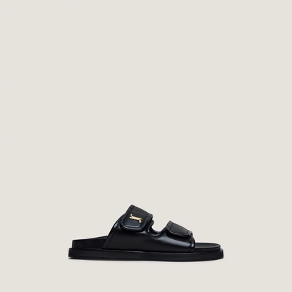 Mules &agrave; monogrammes in black leather | win