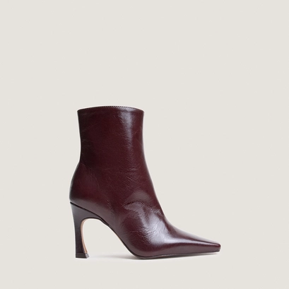 Heeled pointed toe ankle boots in chocolate aged leather | bronzo