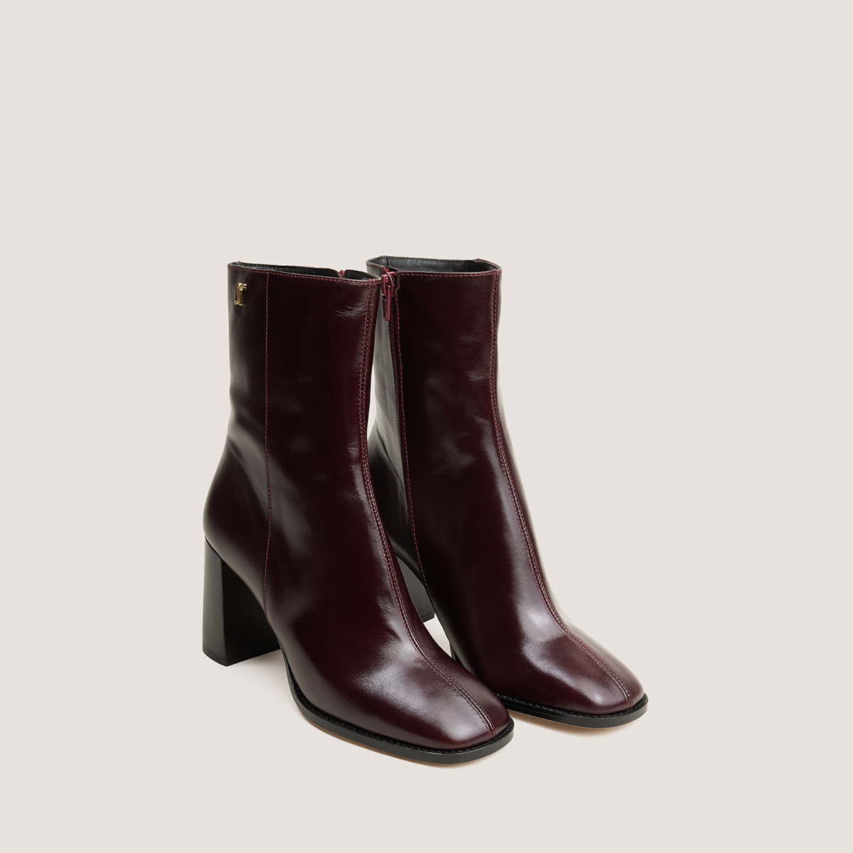 Heeled monogram ankle boots burgundy