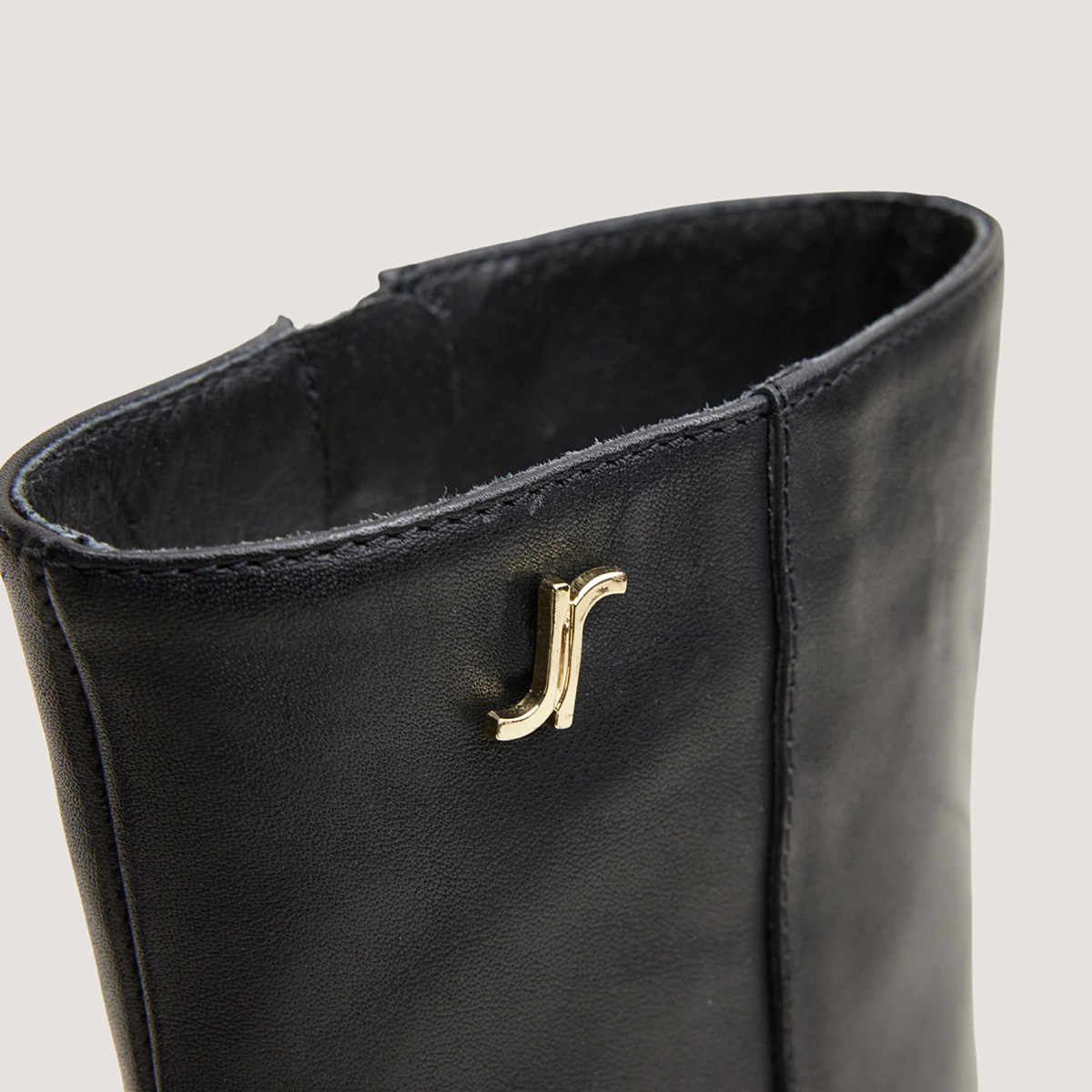 Heeled monogram ankle boots black