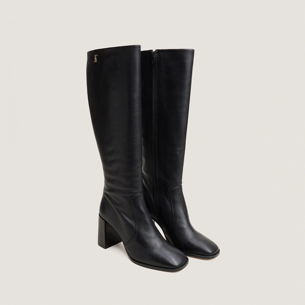 Heeled monogram boots in black leather | VAUBO