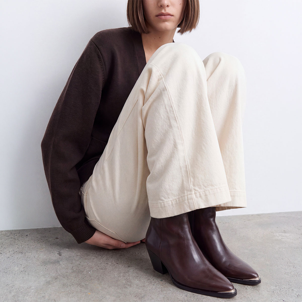 Heeled ankle boots with silver toe caps brown