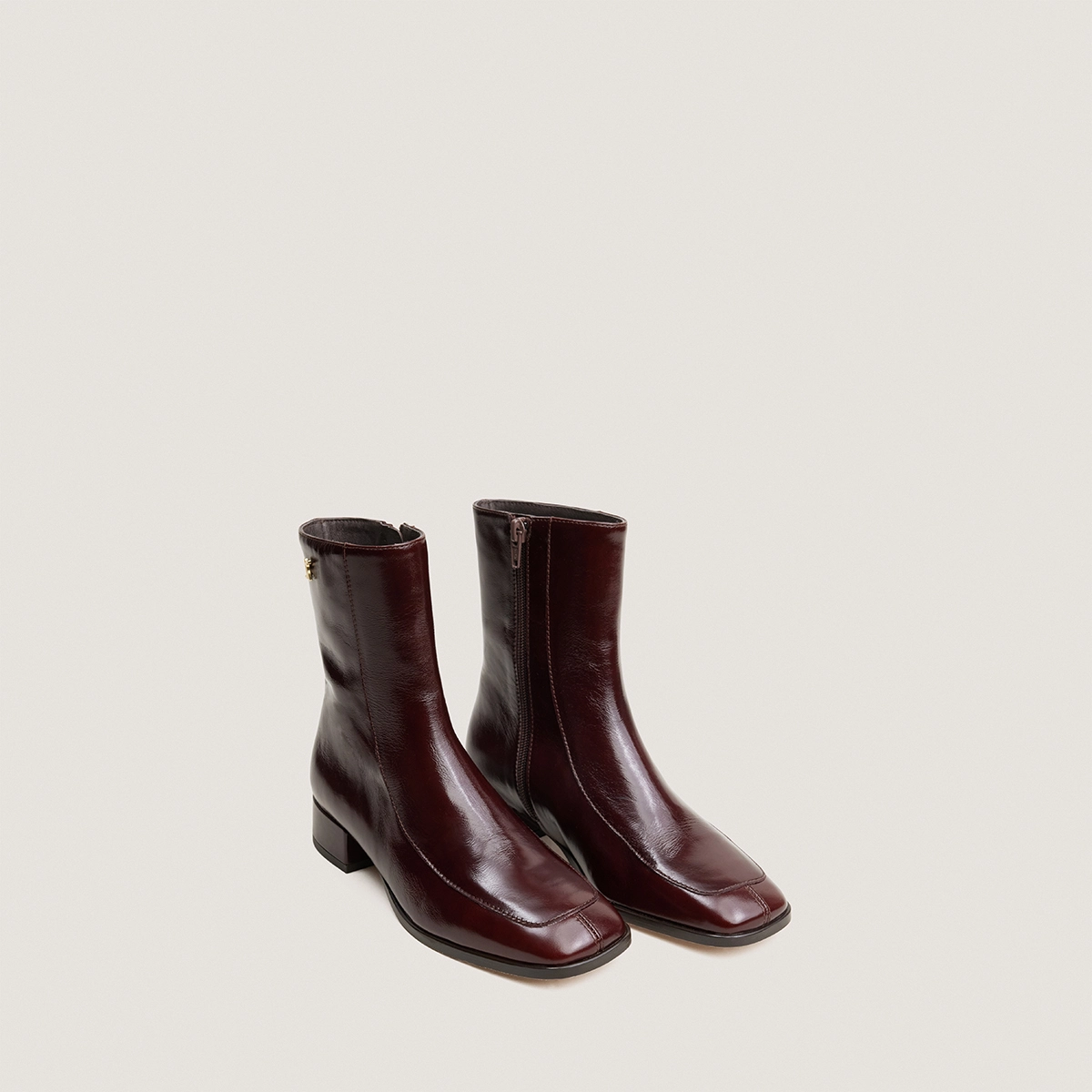 Square-toe ankle boots with monogram in chocolate vintage leather | VAREL