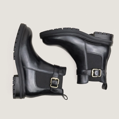 Low boots with buckles and lug soles in black leather | agile