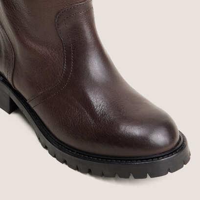 High boots with lug soles in brown grained leather | roxy