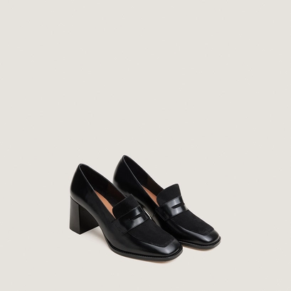 Heeled loafers in black leather and velvet | varia