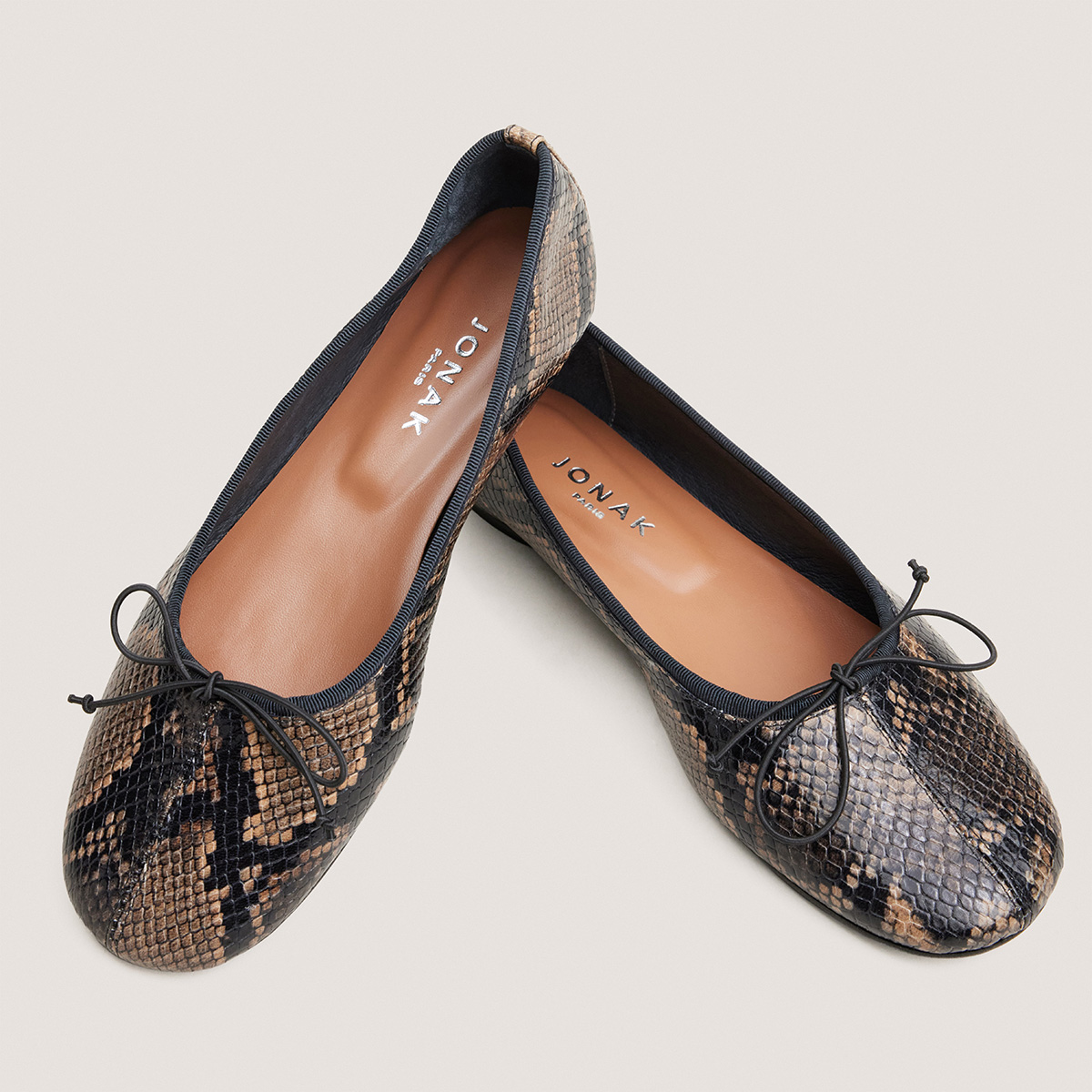 Ballet flats with small laces in taupe python-effect leather | DALLETTE
