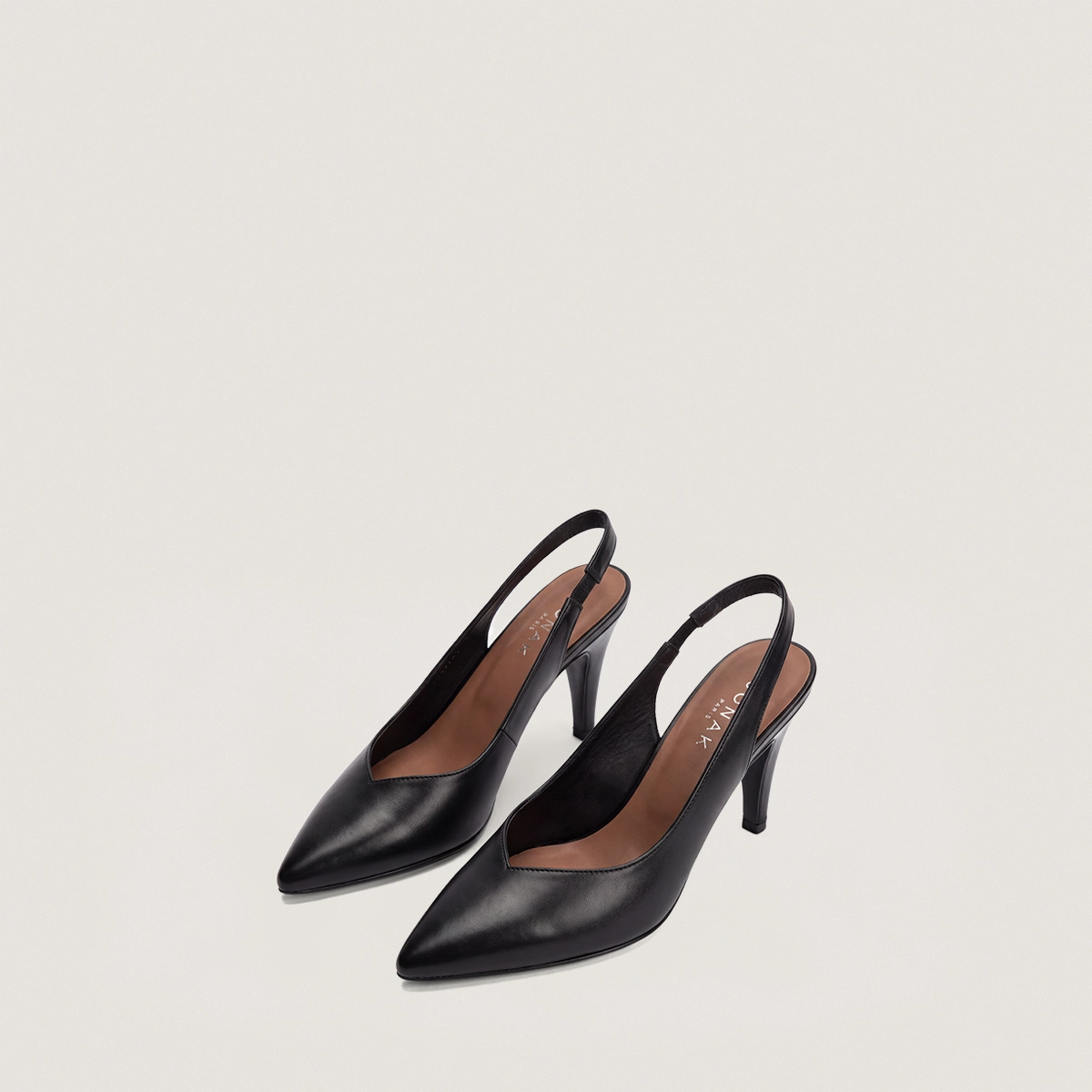 Pointed-toe slingback pumps in black leather | DILETTO