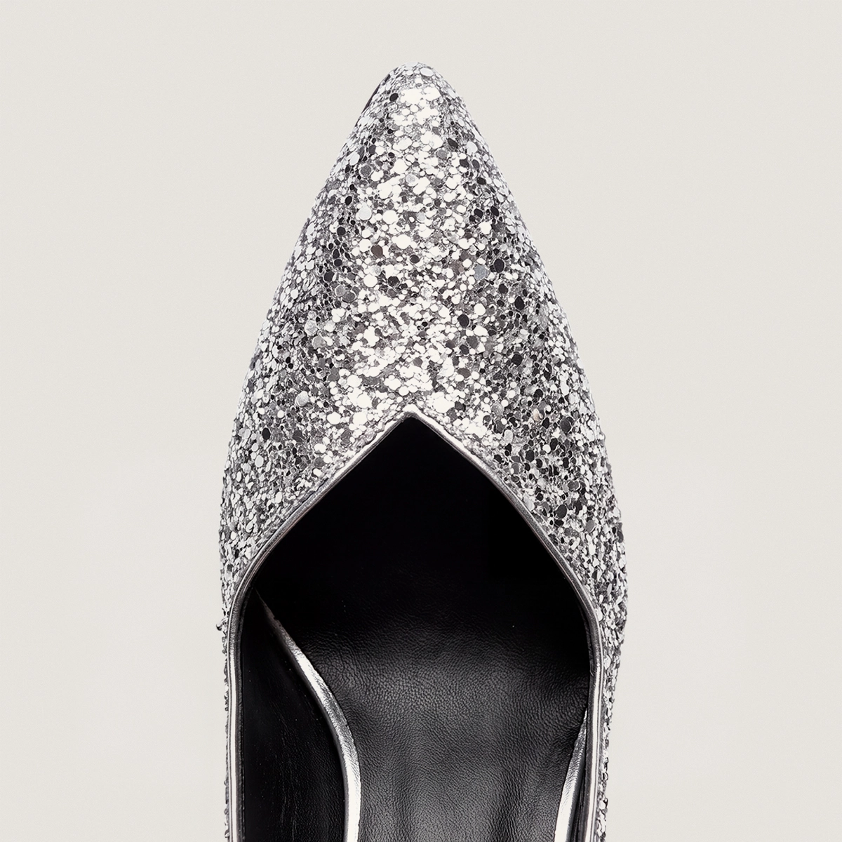 Pointed-toe slingback pumps in silver glitter | DILETTO
