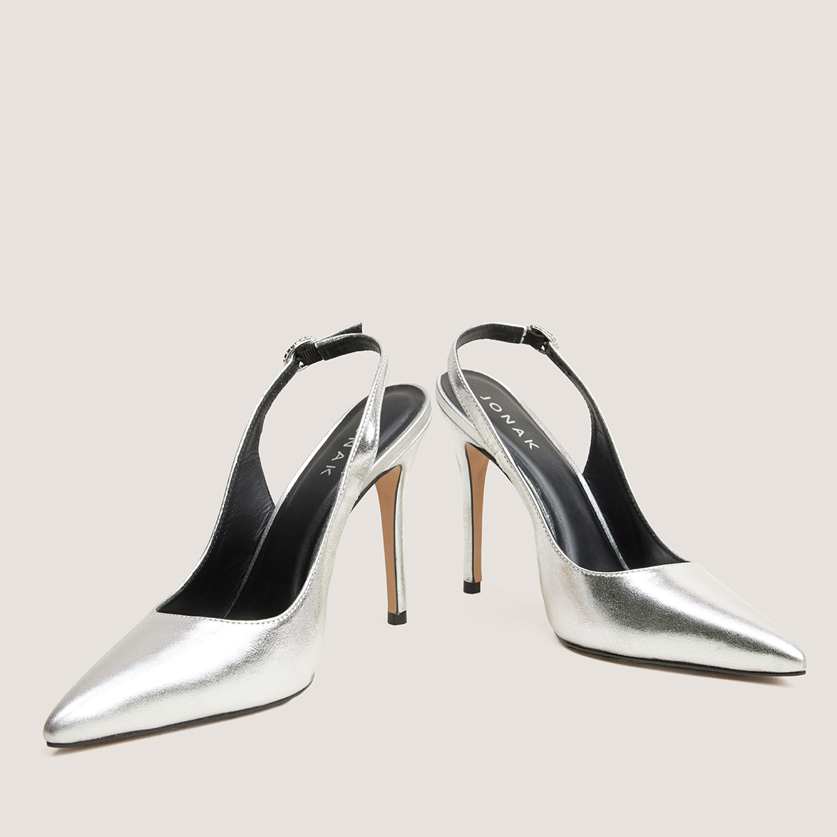 Slingbacks with pointed toes in silver metallic leather | FLAMME
