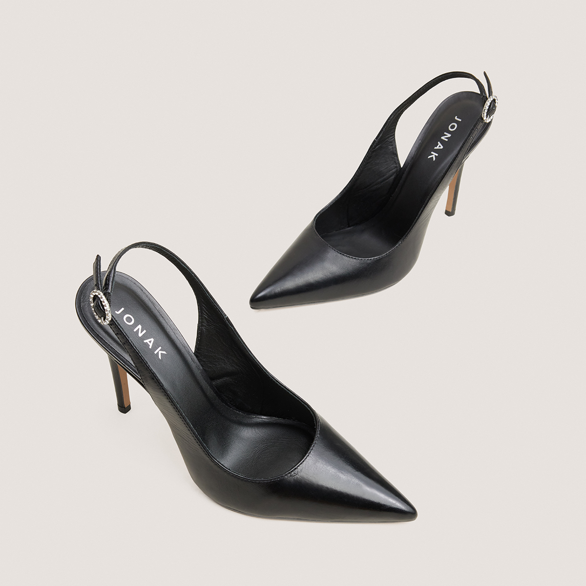 Slingbacks with pointed toes in black leather | FLAMME