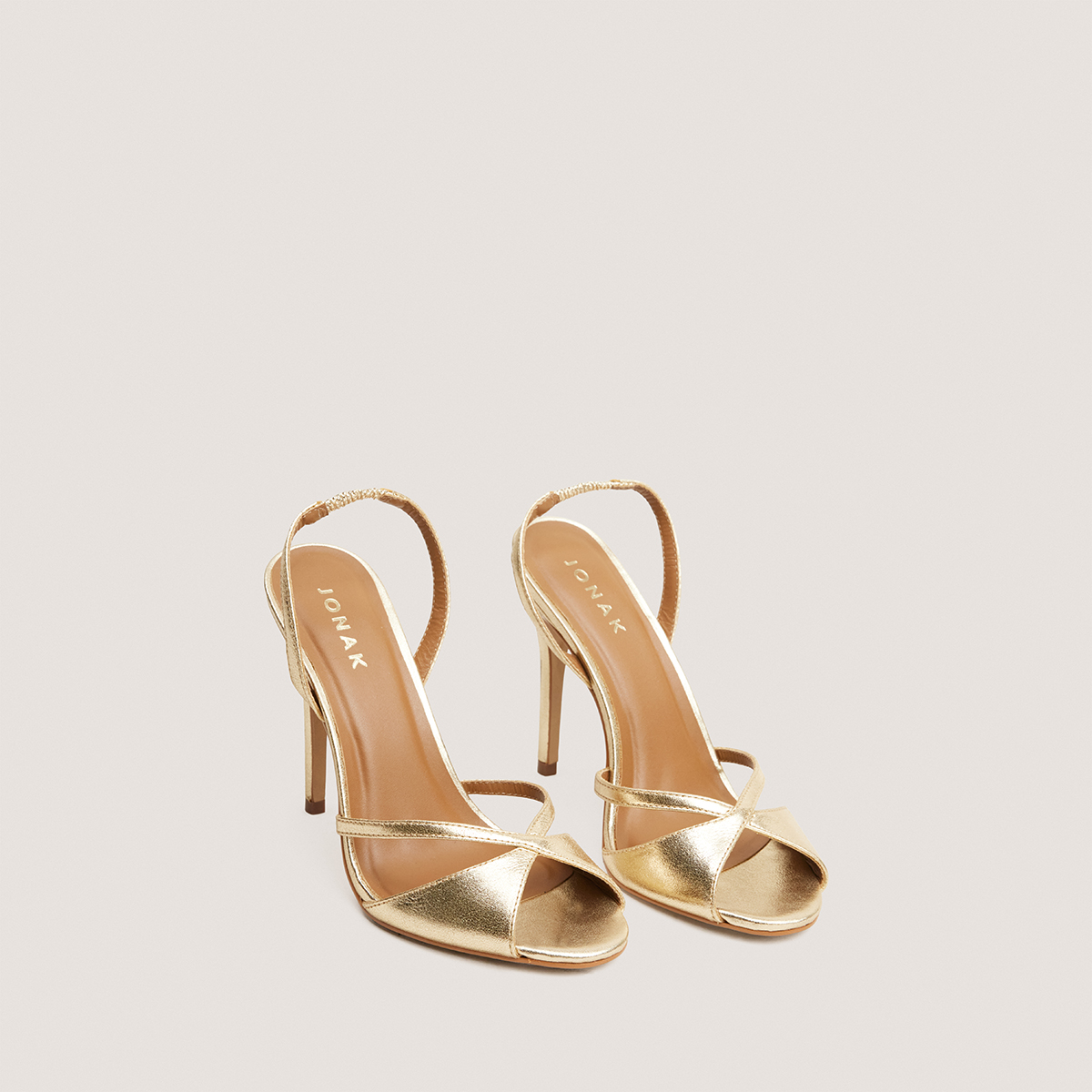 Heeled sandals with round toes in gold metallic leather | FANTAISIE