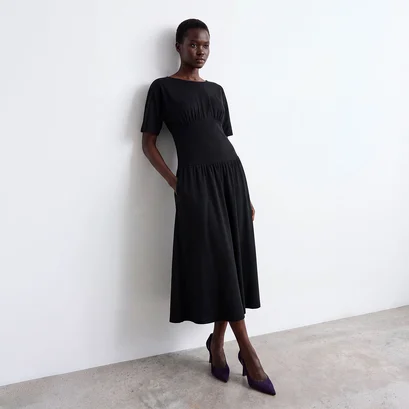 Heeled pointed-toe pumps in purple suede | dedgar