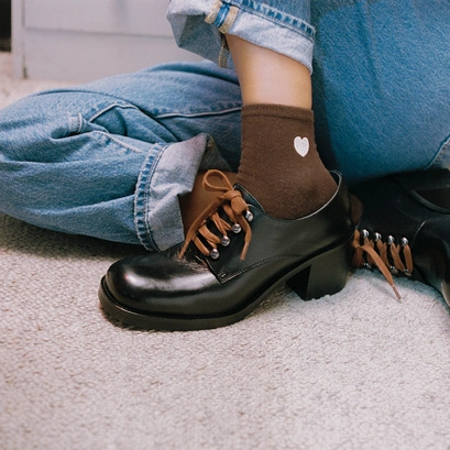 Heeled derbies in black leather | divalus