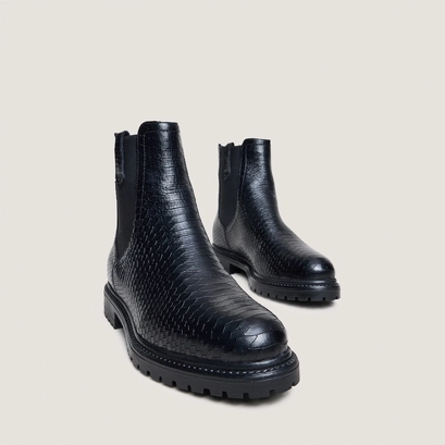 Low boots with notched soles and elastic in black reptile | candide
