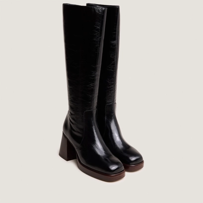 Bottes &agrave; plateformes in distressed black leather | betina