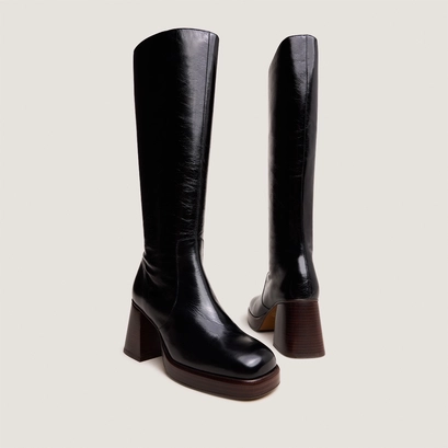 Bottes &agrave; plateformes in distressed black leather | betina