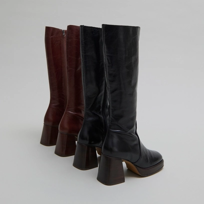 Bottes &agrave; plateformes in distressed black leather | betina