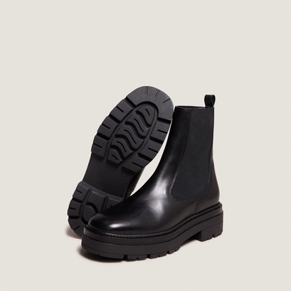 Boots &agrave; plateformes in black leather | picus