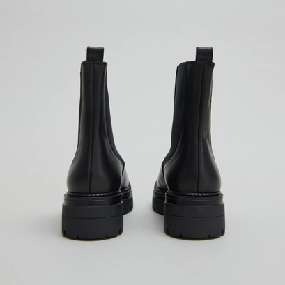 Boots &agrave; plateformes in black leather | picus