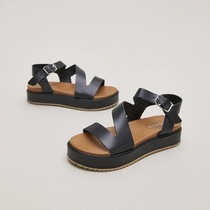 Sandales &agrave; plateformes et lani&egrave;res in black leather | isaure