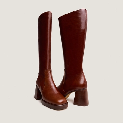 Bottes &agrave; plateformes in distressed brown leather | betina