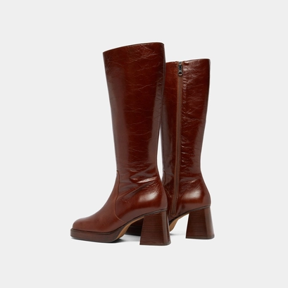 Bottes &agrave; plateformes in distressed brown leather | betina