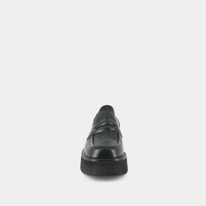 Mocassins &agrave; plateformes in black glazed leather | daffy
