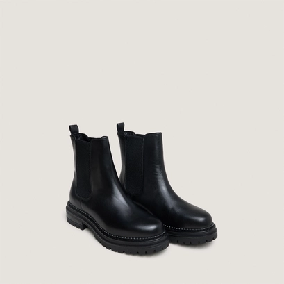 Low boots with notched soles and elastic in black leather | adalard