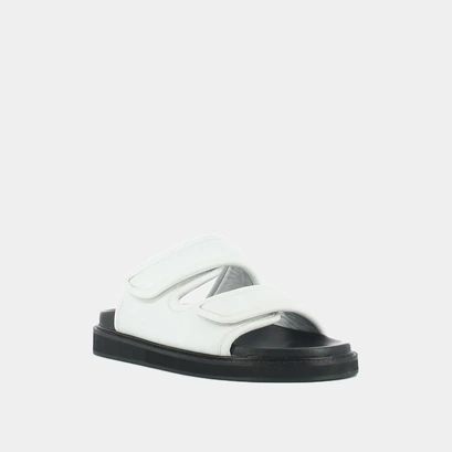 Mules &agrave; doubles fermetures in white leather | warning