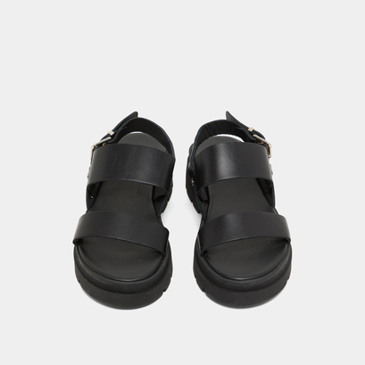 Sandals with thick straps and notched soles in black leather | PEINTURE