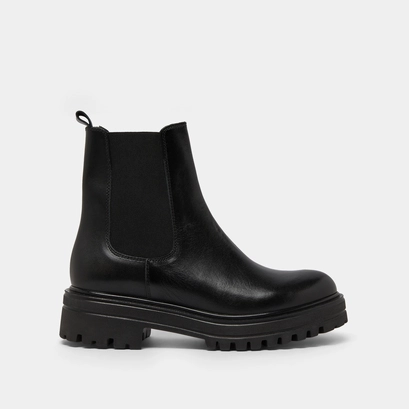 Boots &agrave; semelles crant&eacute;es et &eacute;lastiques in black leather | amandine