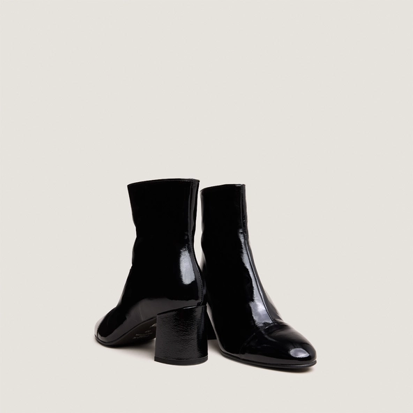 Heeled boots in black pleated patent | DONIAMA