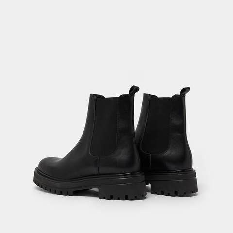 Boots &agrave; semelles crant&eacute;es et &eacute;lastiques black