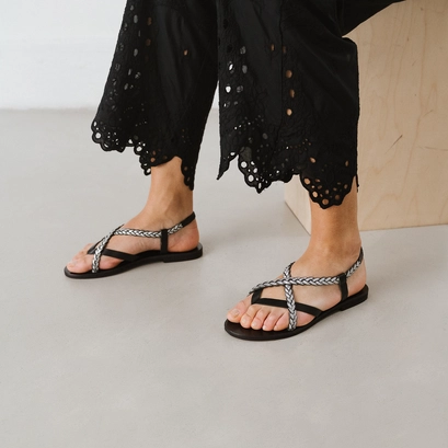 Nu-pieds &agrave; brides tress&eacute;es in black and silver leather | warren