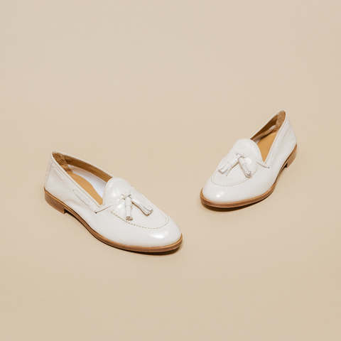 Mocassins &agrave; bouts ronds et pompons ecru