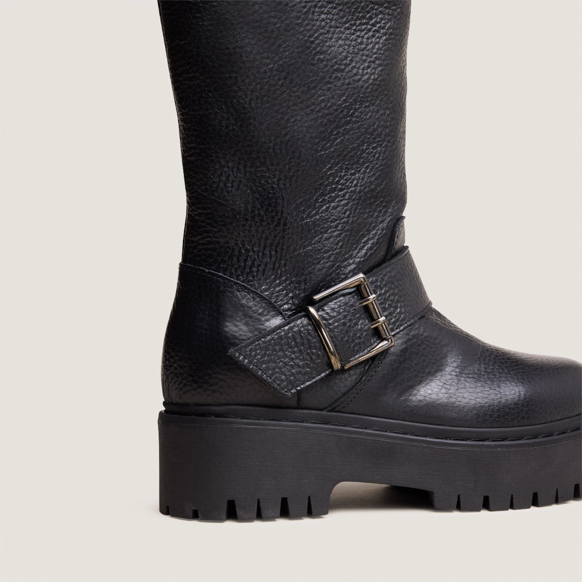 Chunky Strap Boots with Treaded Soles in black grained leather | REINE