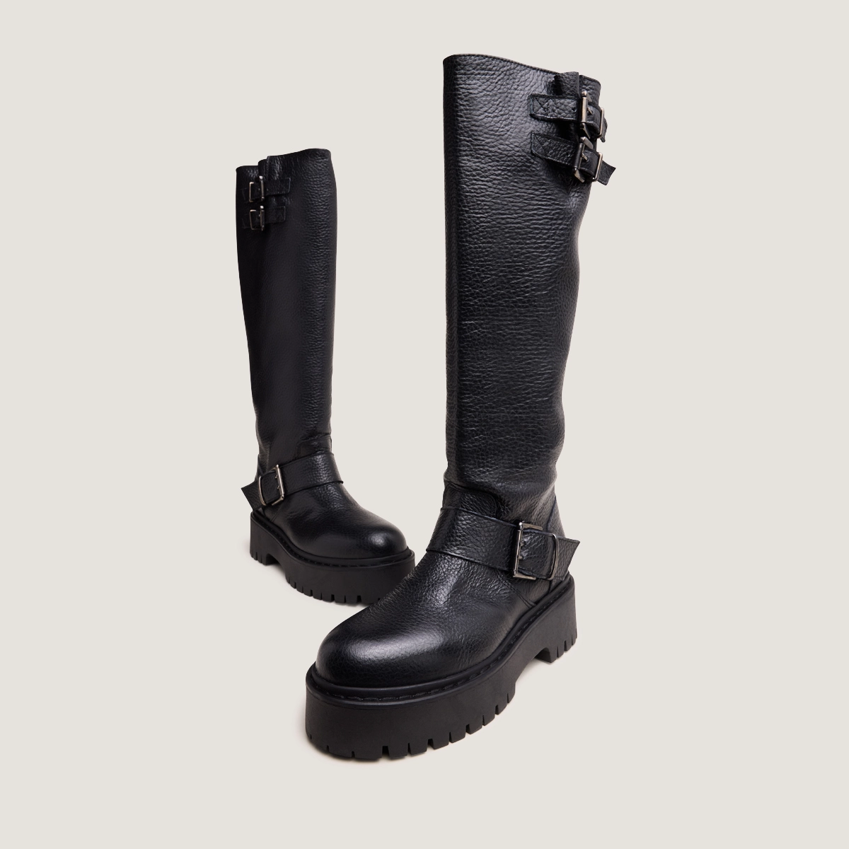 Chunky Strap Boots with Treaded Soles in black grained leather | REINE
