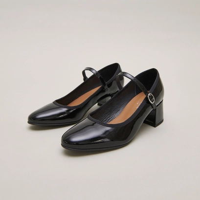 Heeled slippers in black patent leather | dalmatie