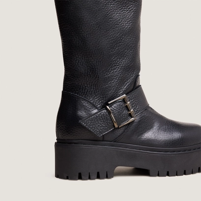 Chunky strap boots with treaded soles in black grained leather | reine