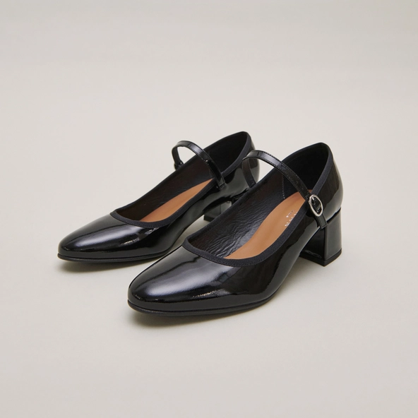 Heeled slippers in black patent leather | DALMATIE