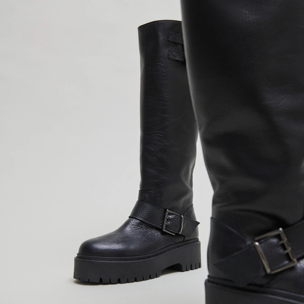 Chunky Strap Boots with Treaded Soles in black grained leather | REINE