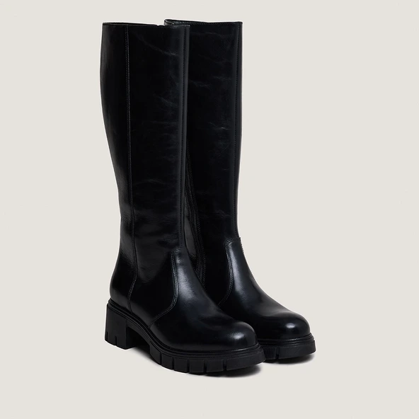 Bottes à semelles crantées in black leather | ANTONIN